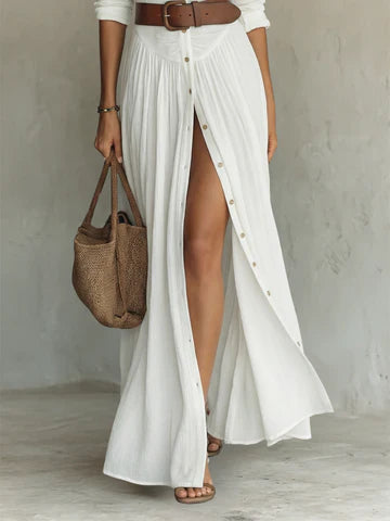 Vestido largo de lino con cuello de solapa con muesca y mangas largas. Precio normal