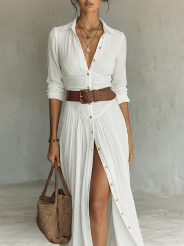 Vestido largo de lino con cuello de solapa con muesca y mangas largas. Precio normal