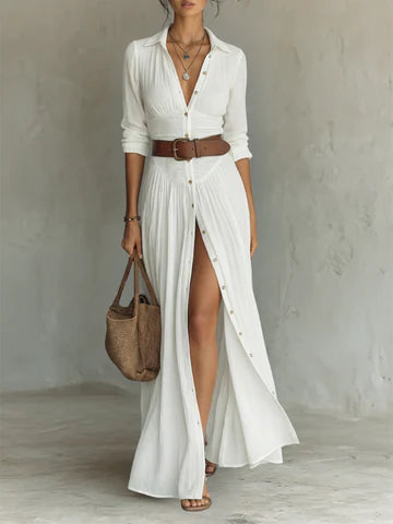 Vestido largo de lino con cuello de solapa con muesca y mangas largas. Precio normal